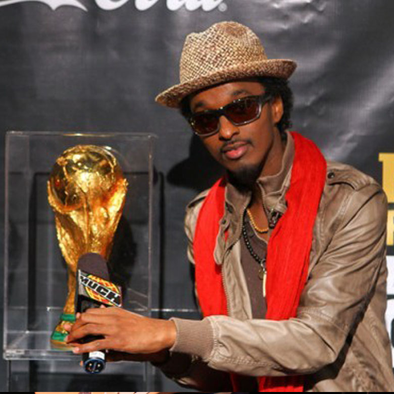 K'Naan with world cup trophy